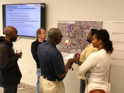 People Looking at a Map 3